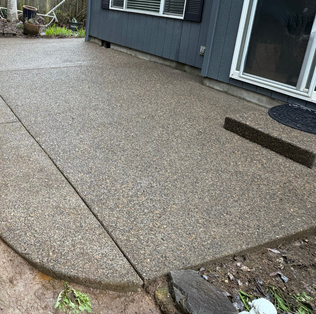 A picture of a cleaned patio in Beaverton, Oregon after power washing services.